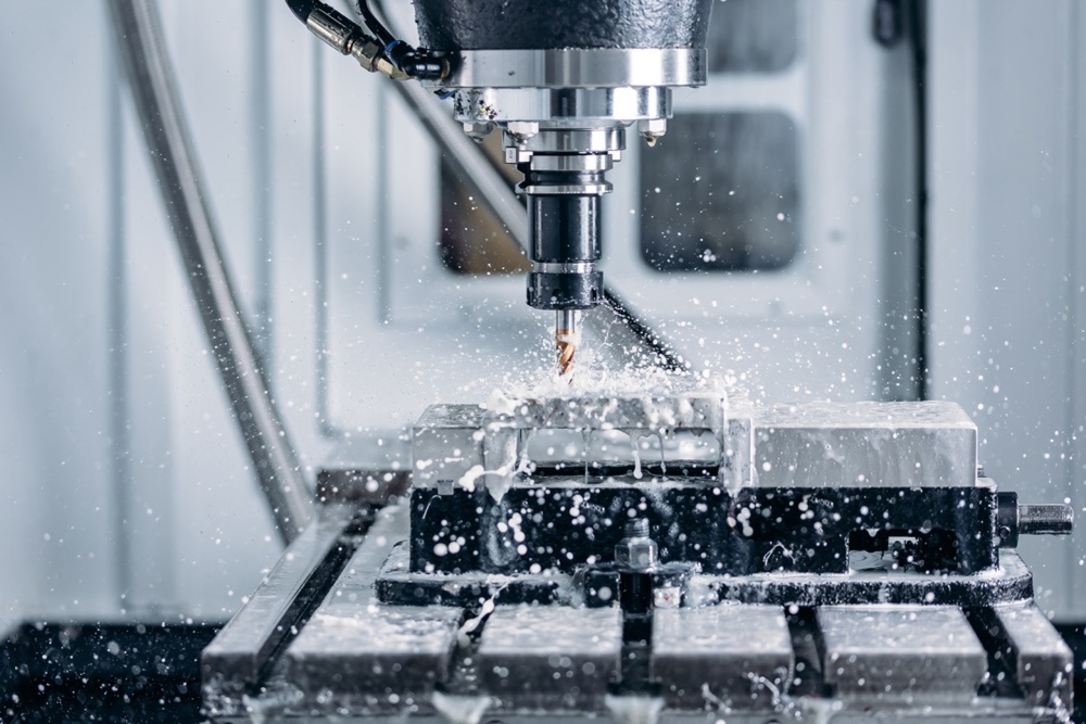 CNC machining center performing precision metal machining in a manufacturing facility